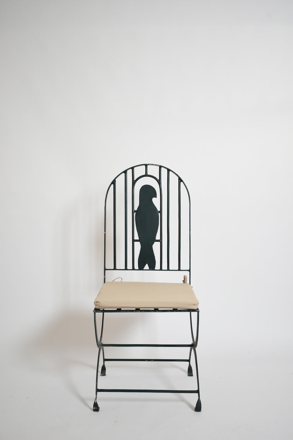 Pair of wrought iron bird cage chairs, 1960s.