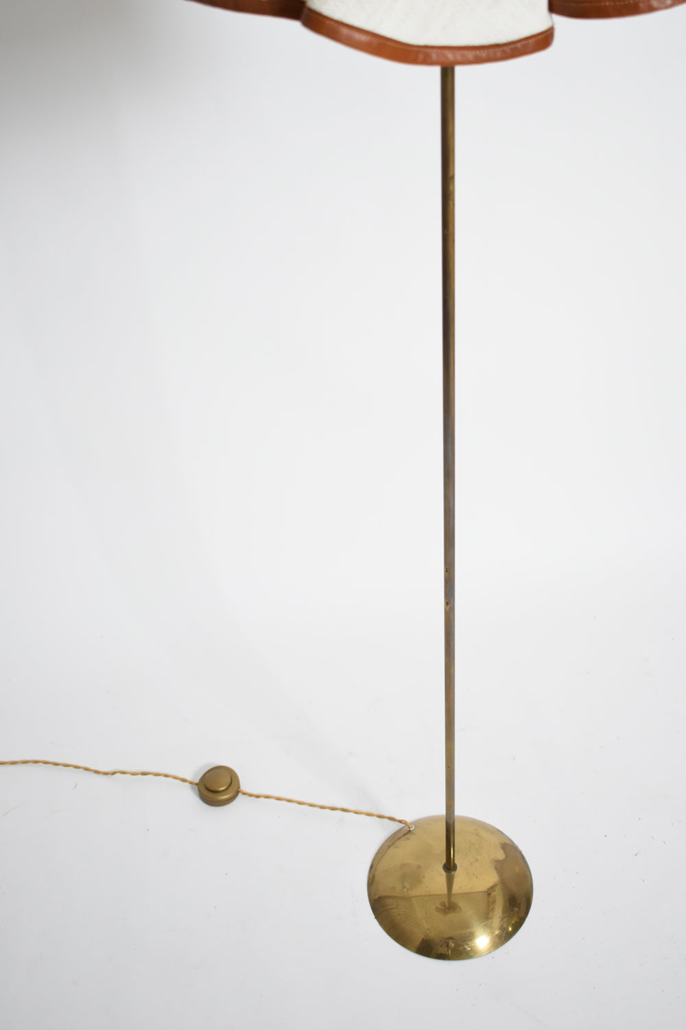 Brass, fabric and leather floor lamp, 1960s.