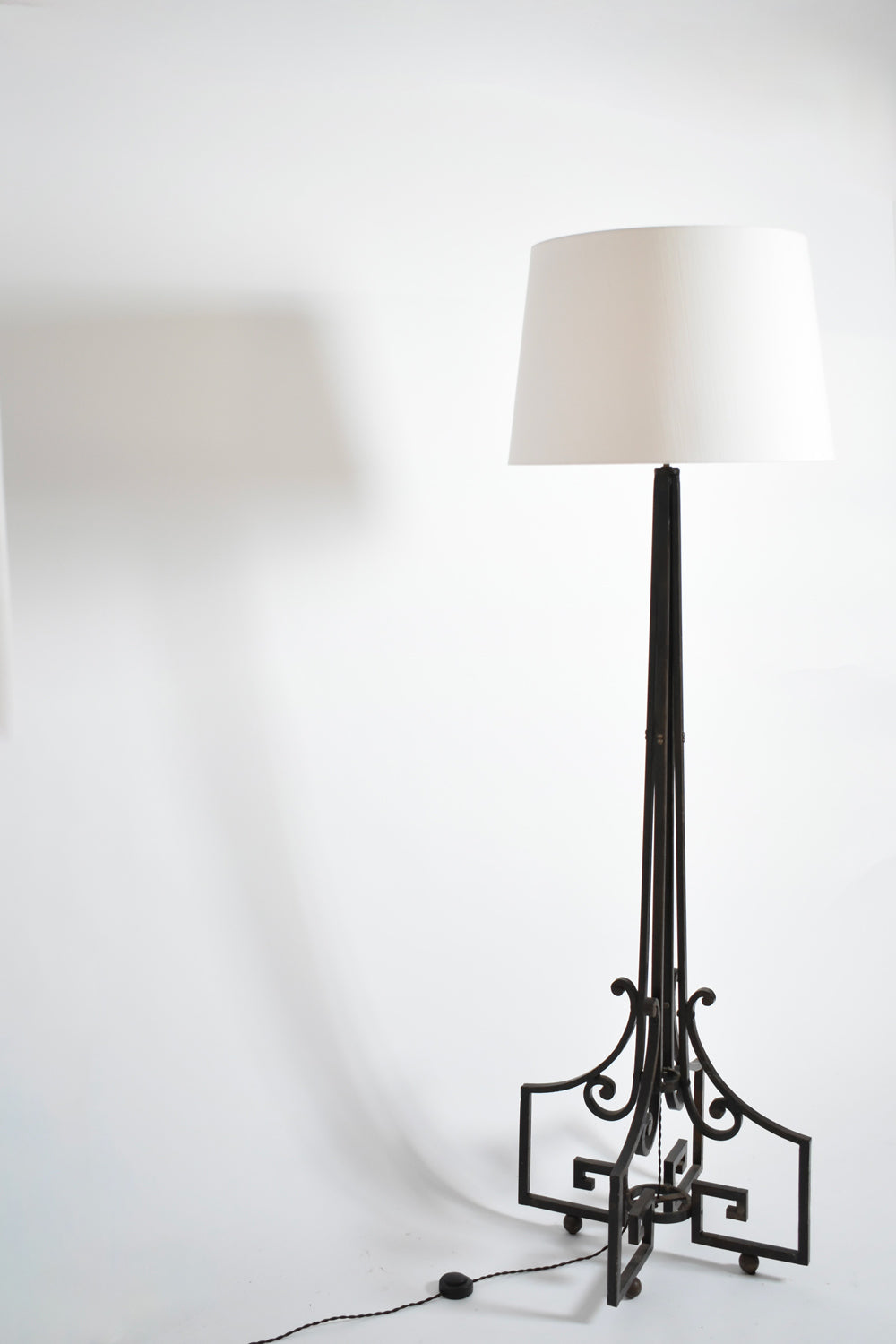 Neoclassical wrought iron floor lamp, 1960s.