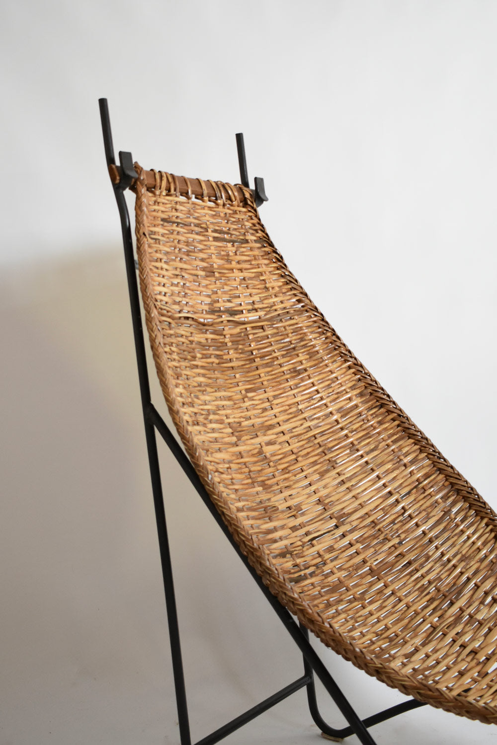 Wrought iron and rattan armchair, 1950s.
