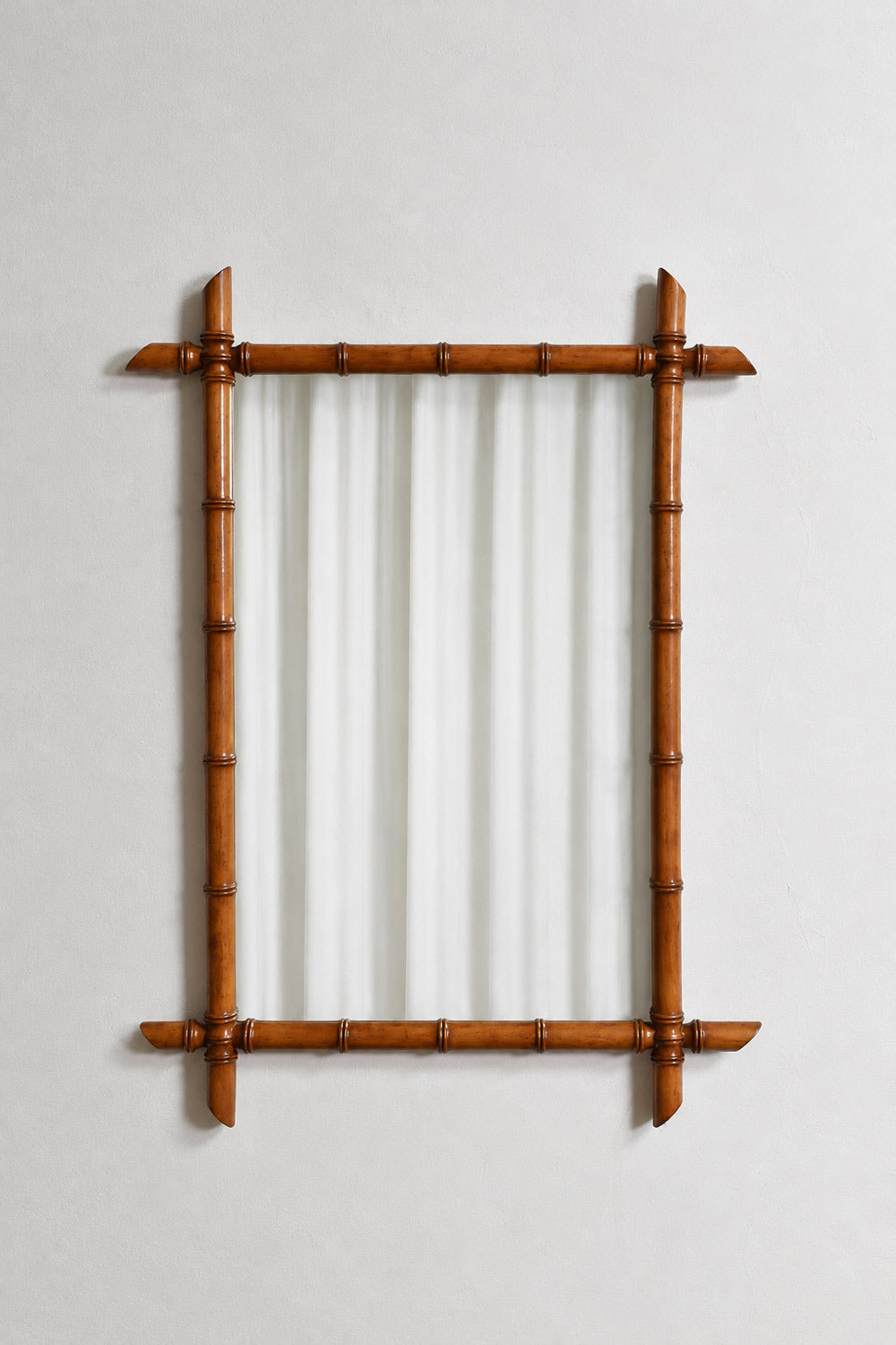 Pair of wooden faux bamboo mirrors, 1920s.