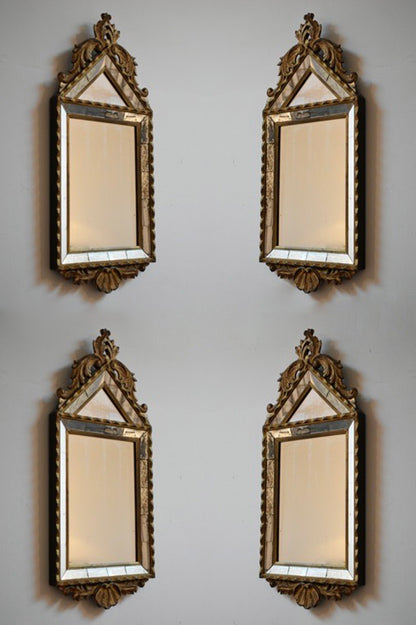 Set of four Pierre Dariel acanthus pediment mirrors, 1940s.