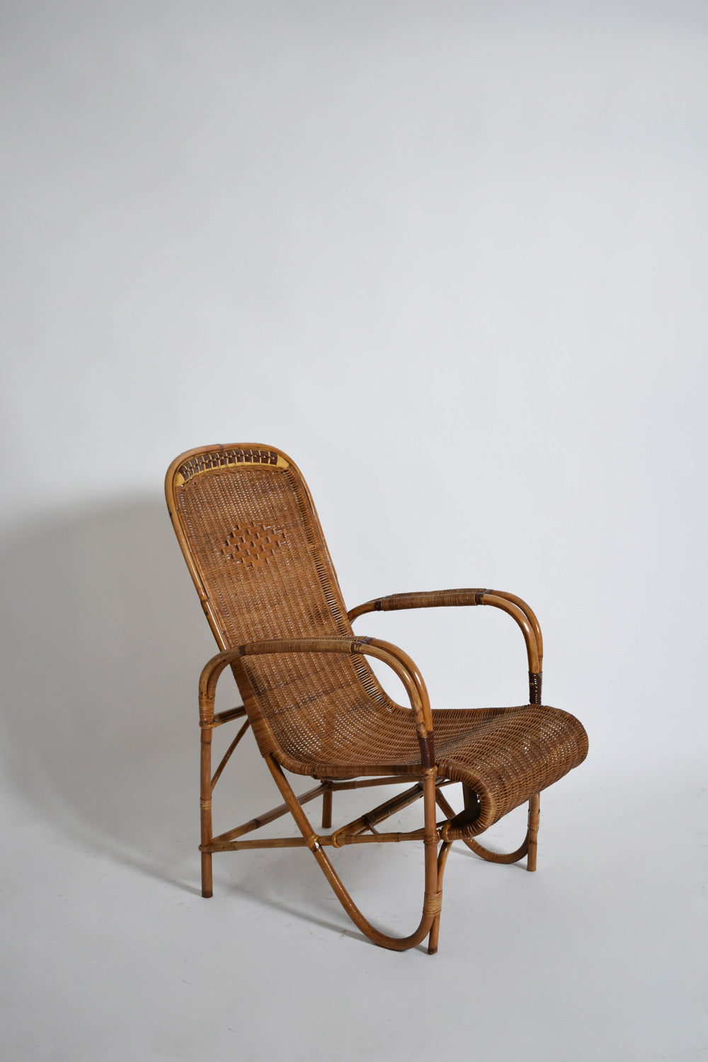 Rattan and wicker high back armchair, 1950s.