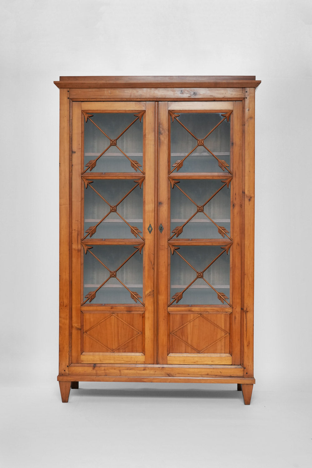 Directorie blond wood cabinet with glass doors, 19th c.