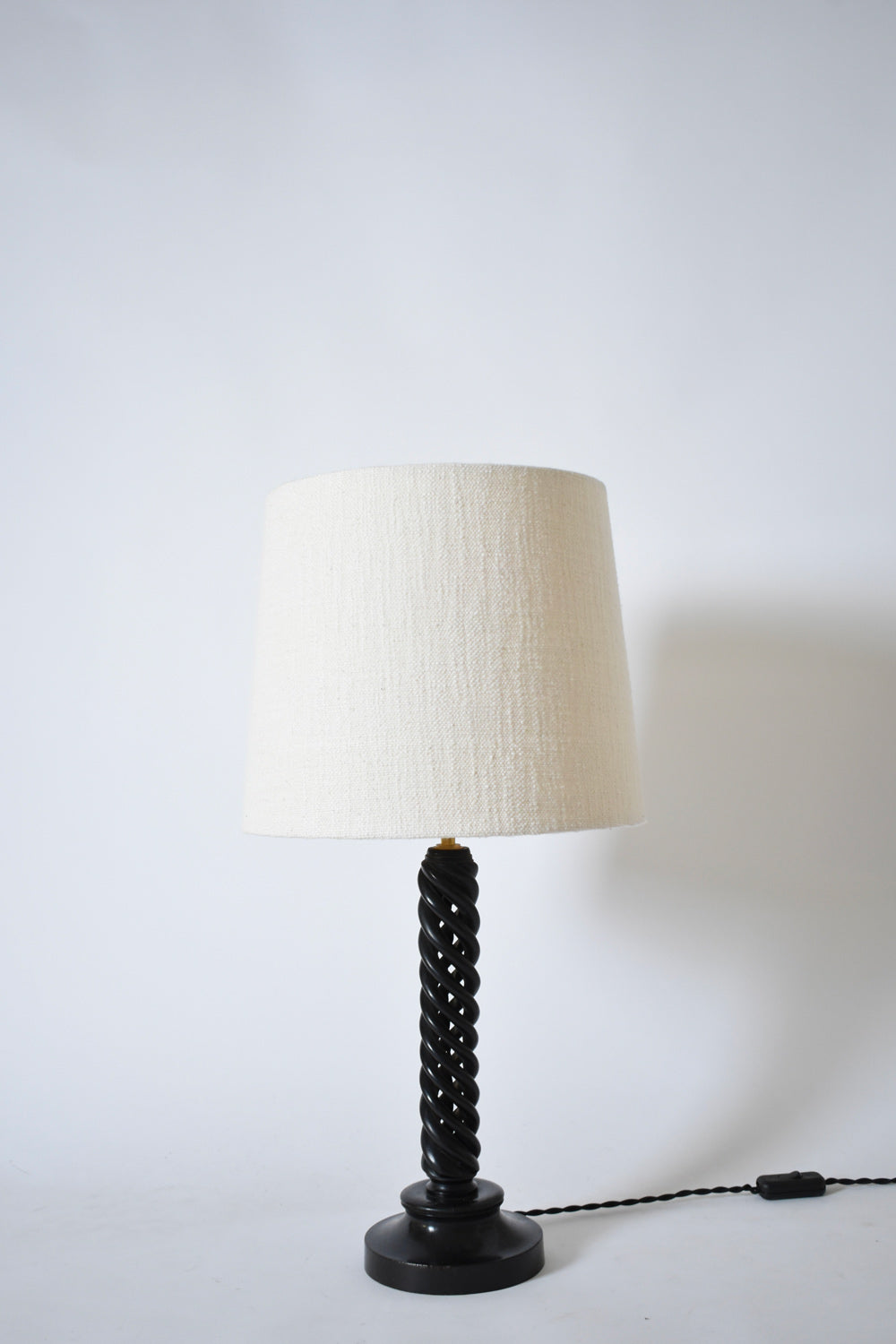 Turned ebonised wooden lamp, 1960s.