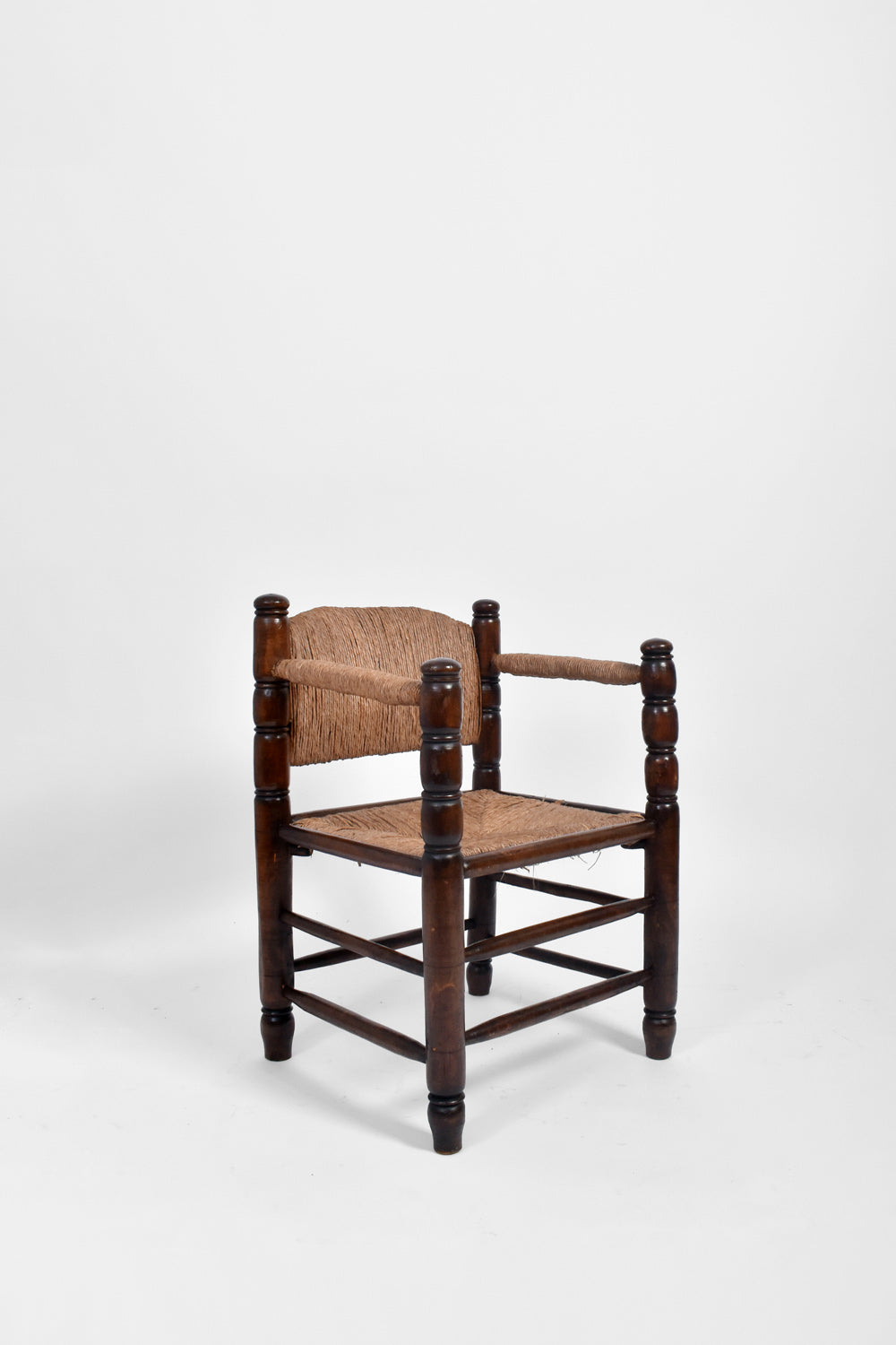 Pair of turned wood and straw  armchairs, 1950s.