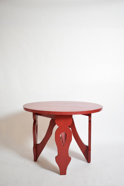 Burgundy red rustic round table, 1920s.