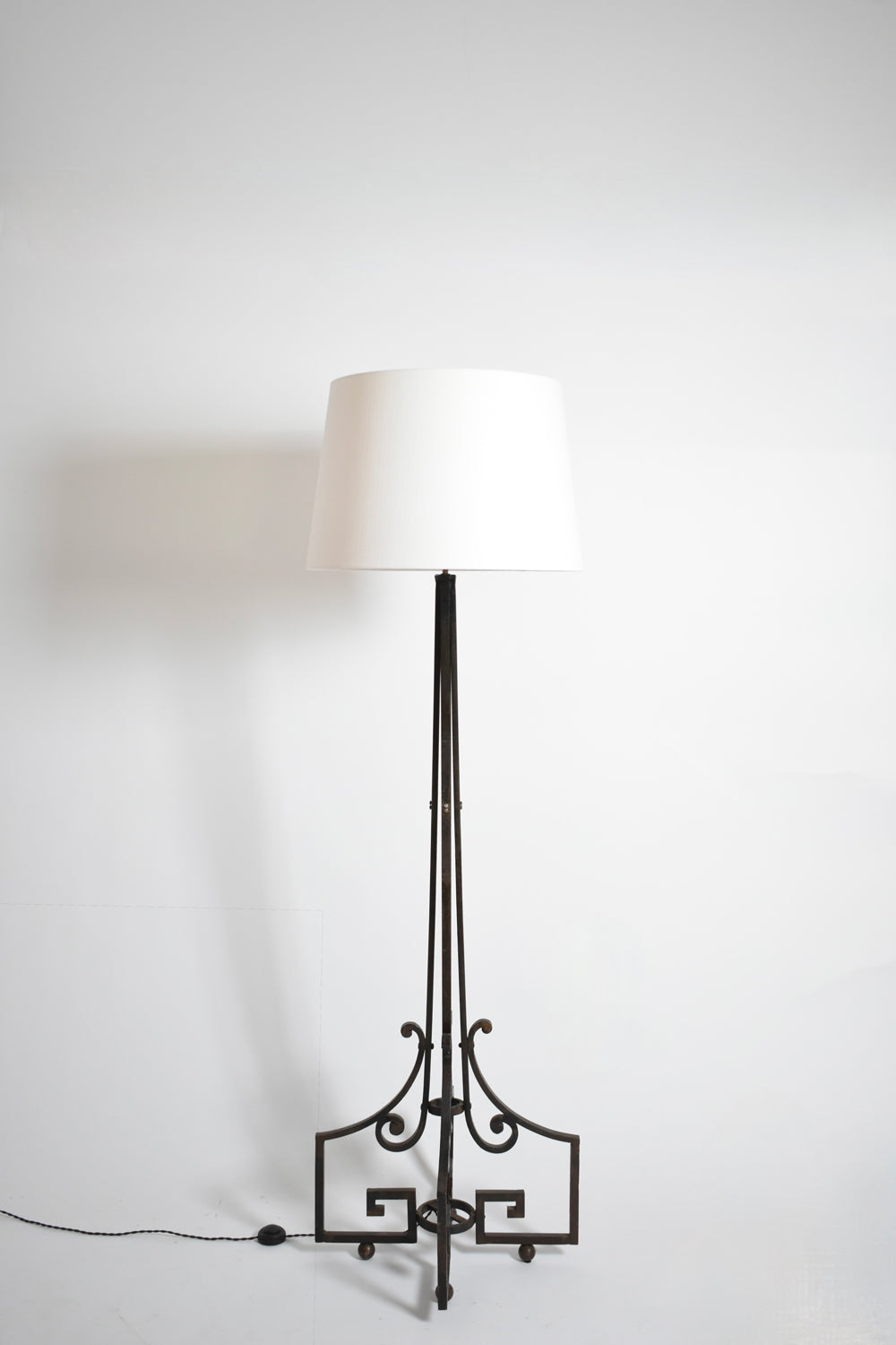 Neoclassical wrought iron floor lamp, 1960s.