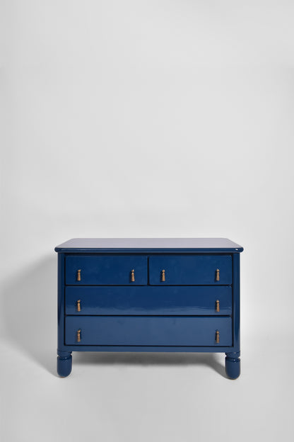 Blue lacquered wood chest of drawers, 1970s.