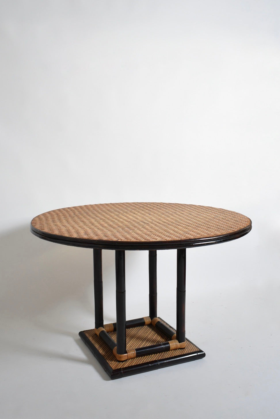 Bicolor round rattan dining table, 1970s.