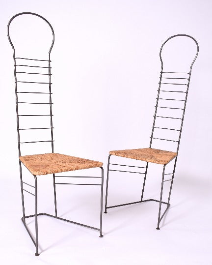 Pair of iron and straw chairs, 1980s.