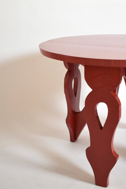Burgundy red rustic round table, 1920s.