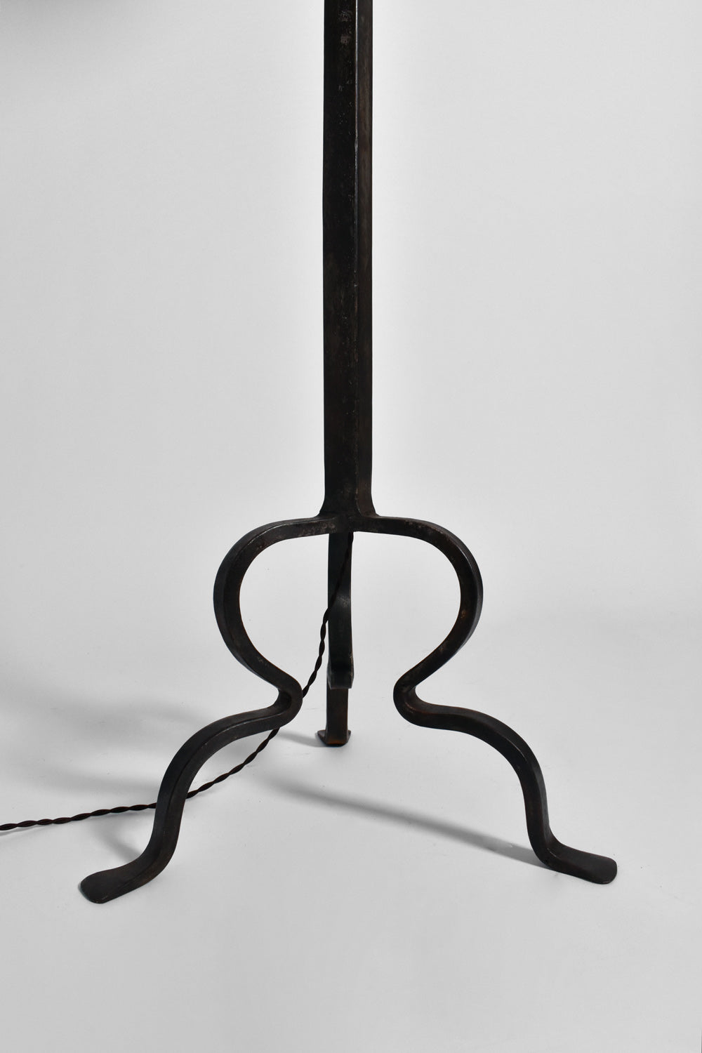 Tripod wrought iron floor lamp, 1960s.