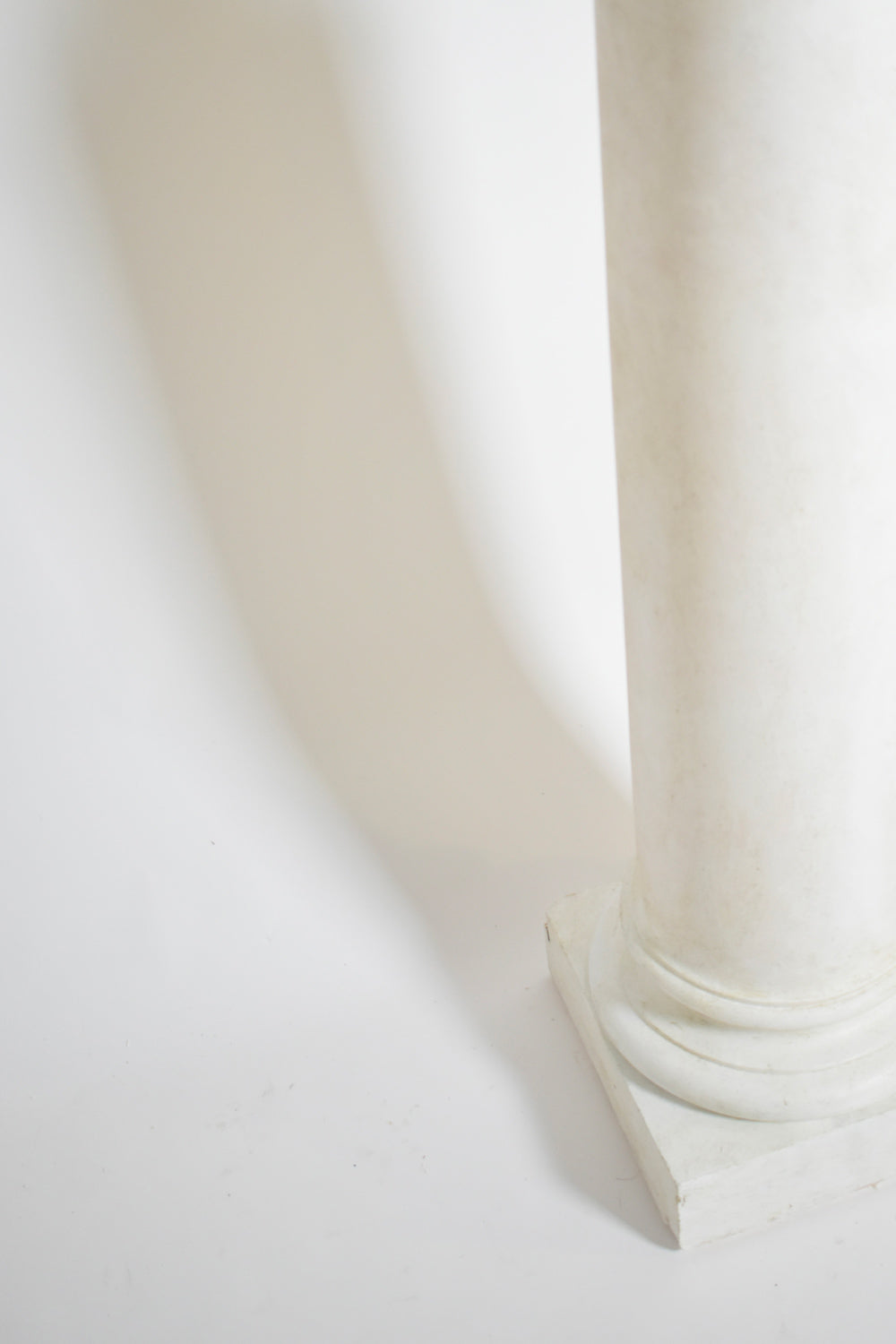 Pair of neoclassical plaster columns, 1930s.