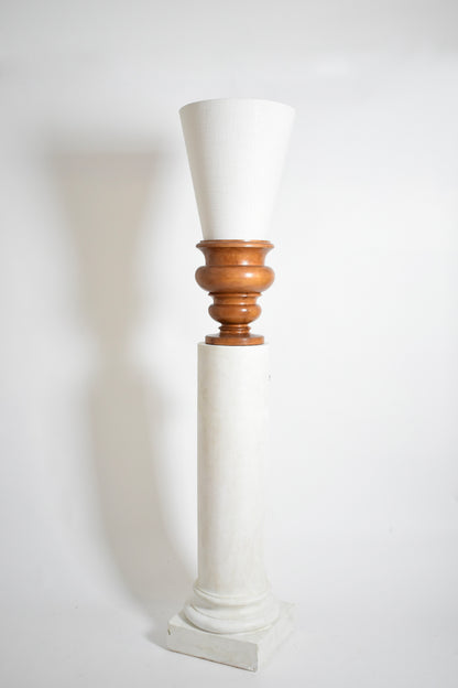Pair of plaster columns and wooden lamps vases.