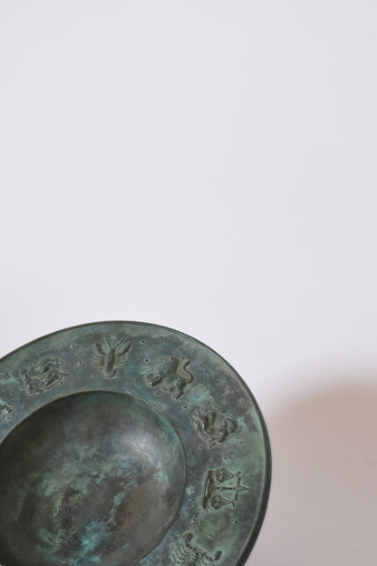 Circular neoclassical bronze plate, 1940s.