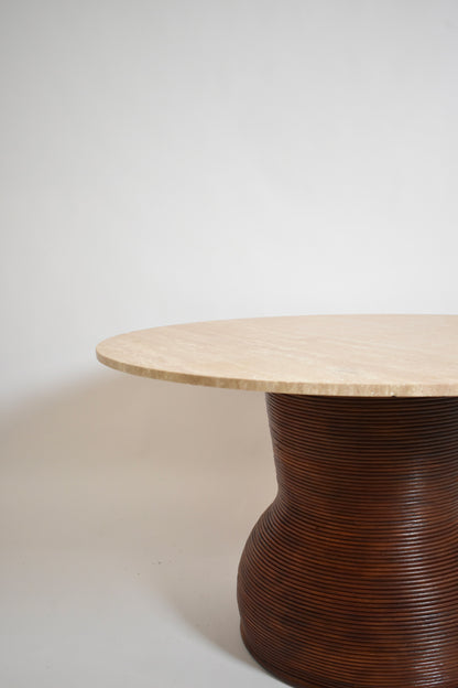 Rattan and travertine round dining table, 1970s.