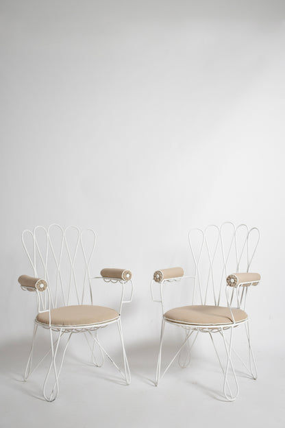 Pair of garden white wrought iron chairs, 1960s.