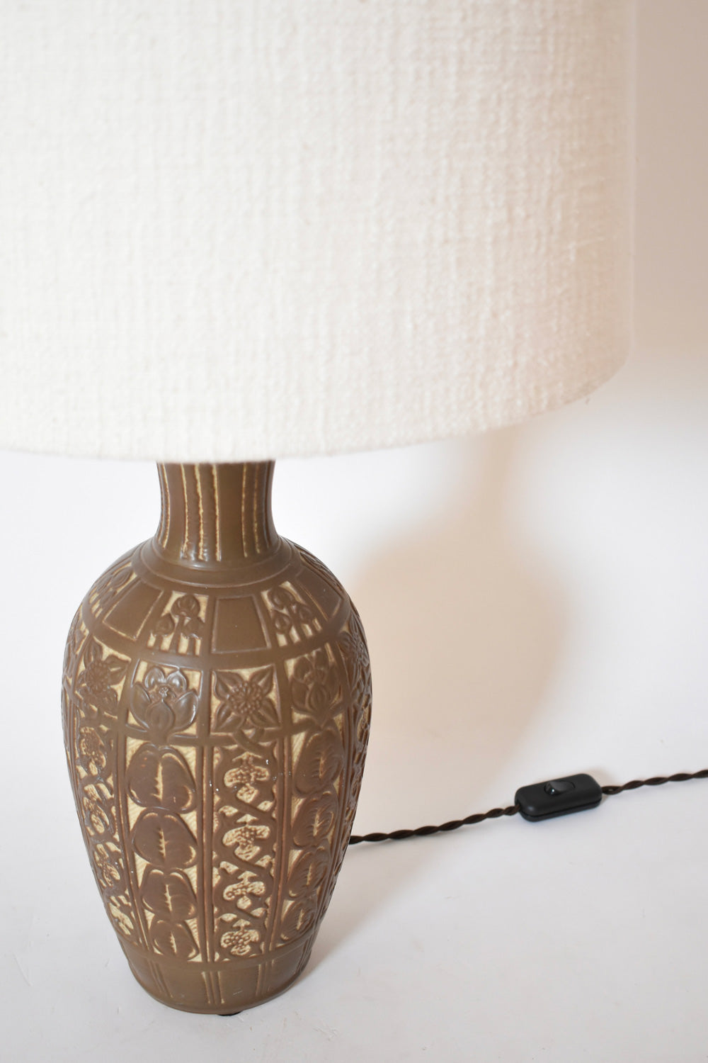 Low relief folliage pattern ceramic lamp, 1930s.