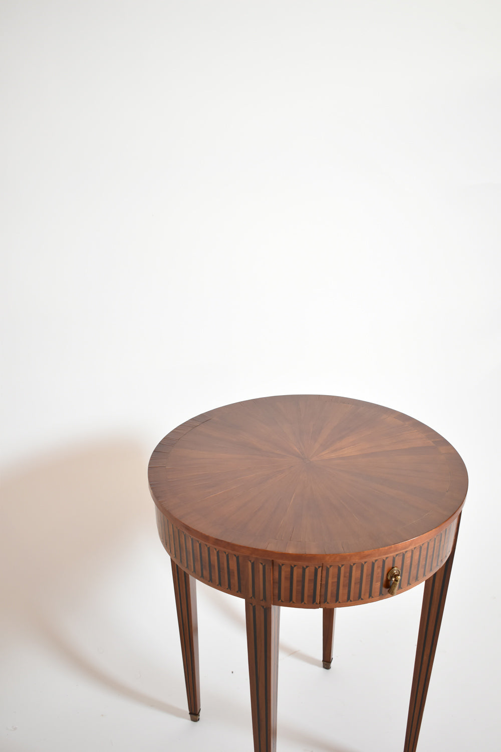 Round marquetry pedestal table, XIXth c.