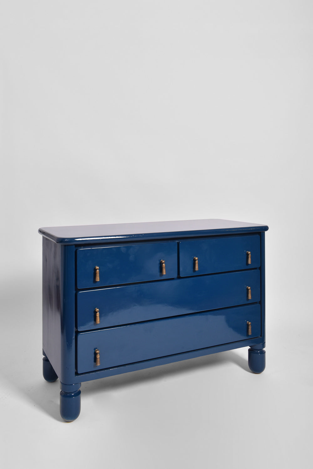 Blue lacquered wood chest of drawers, 1970s.