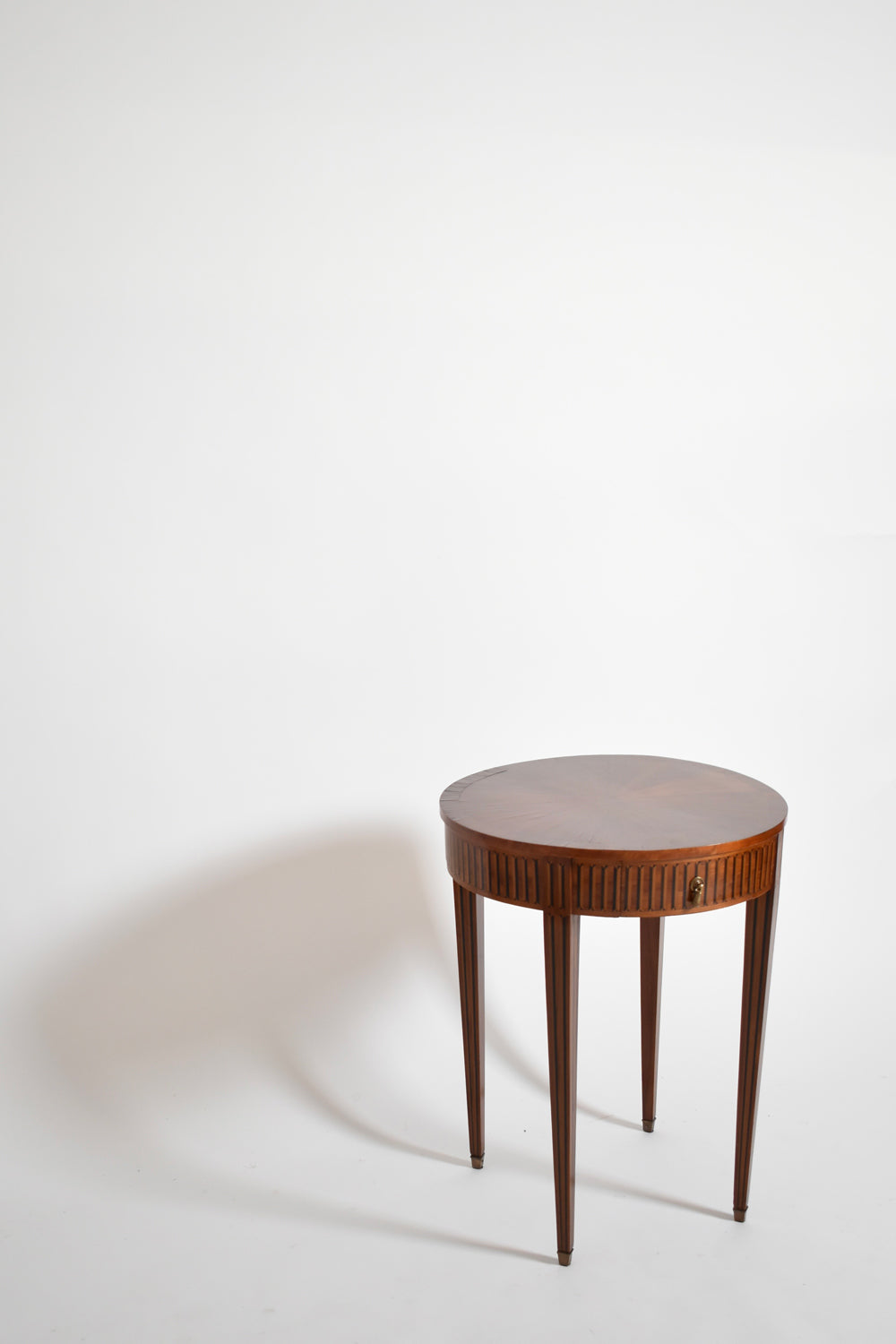 Round marquetry pedestal table, XIXth c.