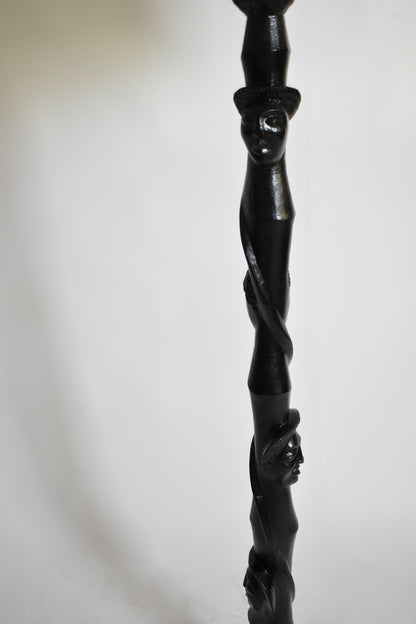 Africanist ebonised wood floor lamp, 1970s.