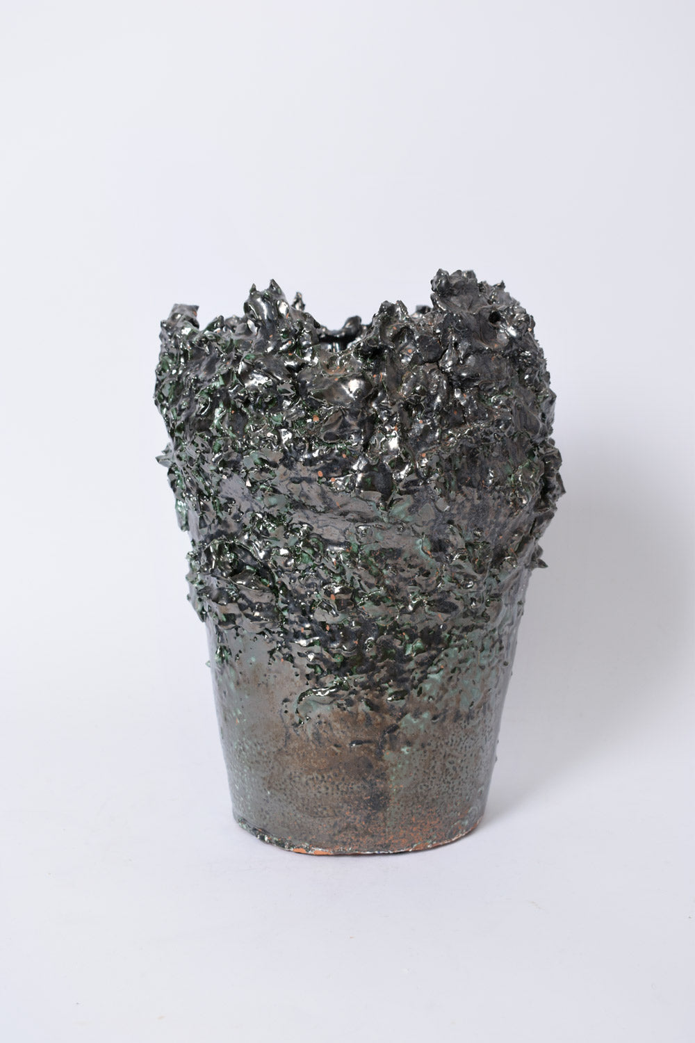 Green and black vase with texture, Helder.