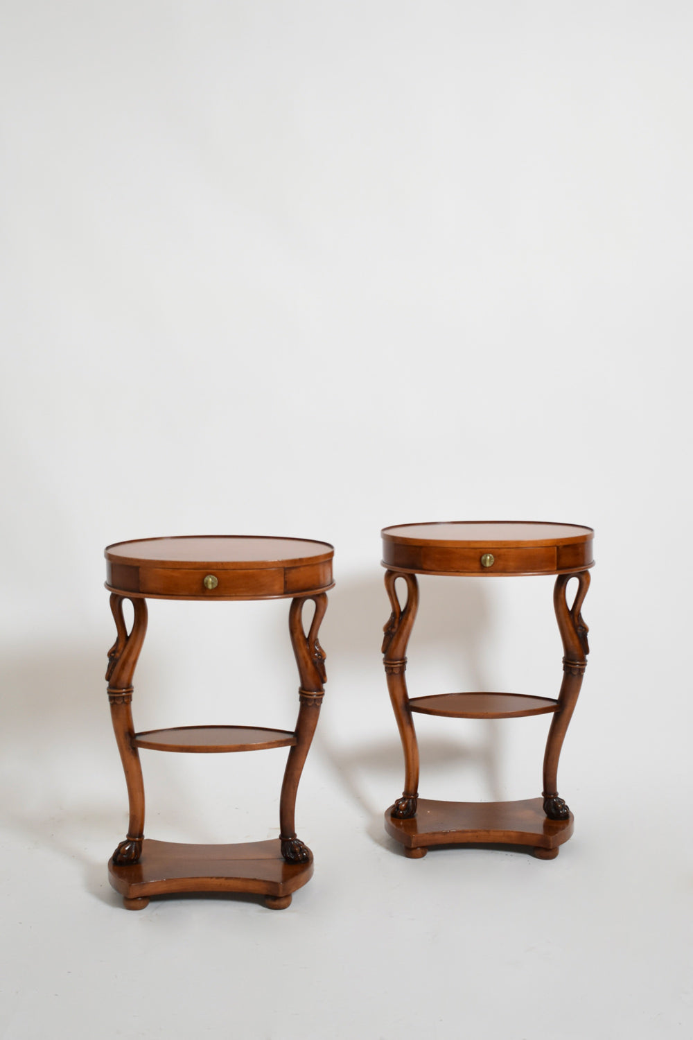 Pair of oval swan side tables, 1900s