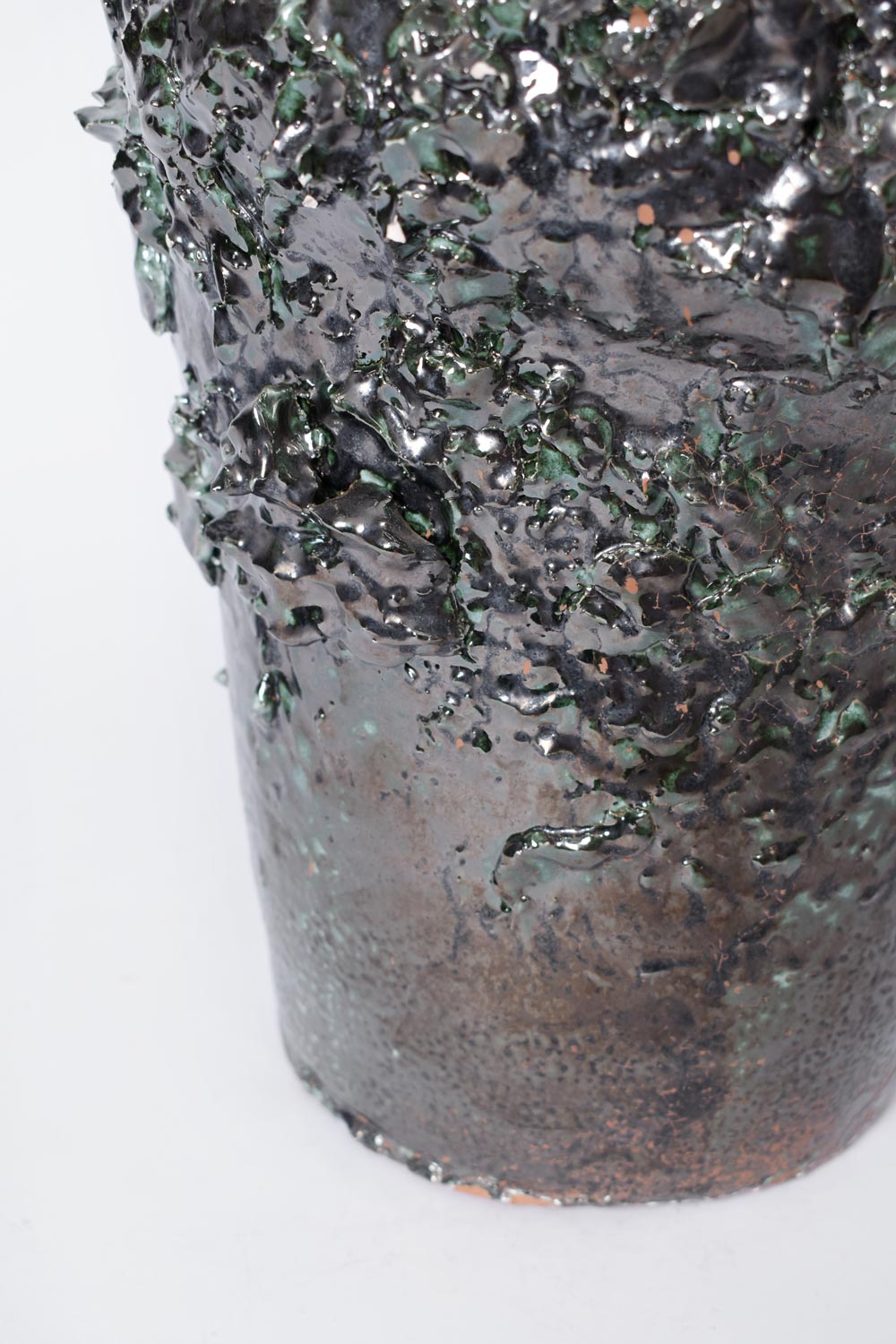 Green and black vase with texture, Helder.