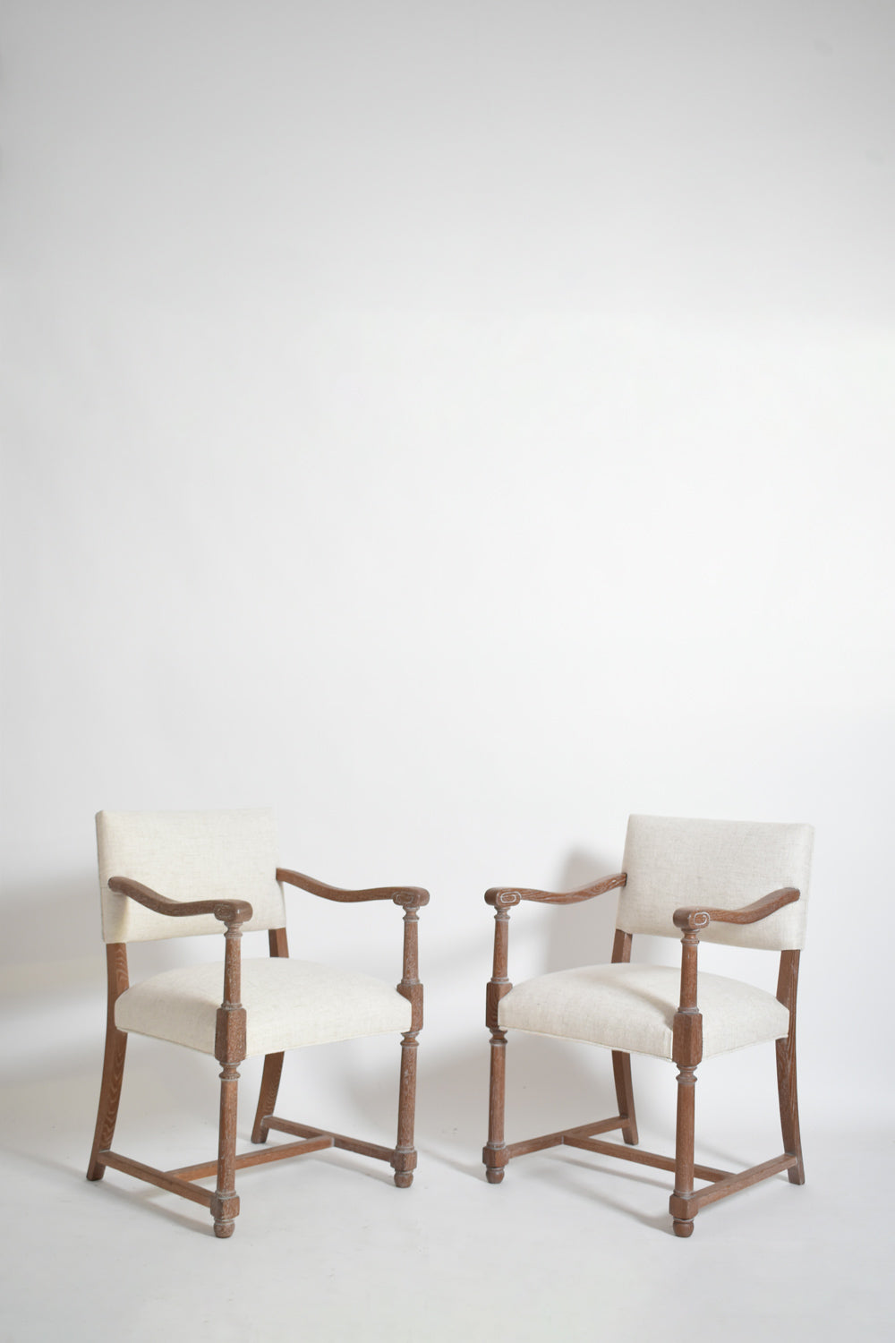 Pair of cerused oak armchairs, 1940s.