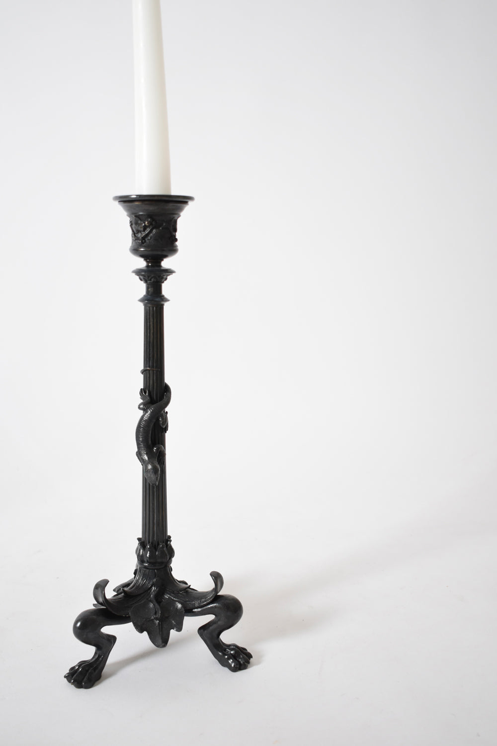 Set of four tripod zoomorphic bronze candleholders, XIXth c.