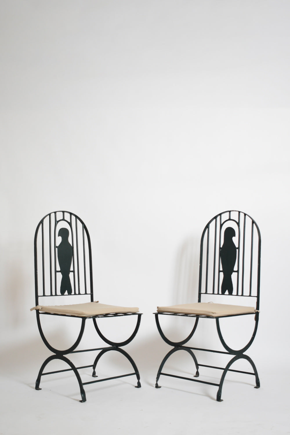 Pair of wrought iron bird cage chairs, 1960s.