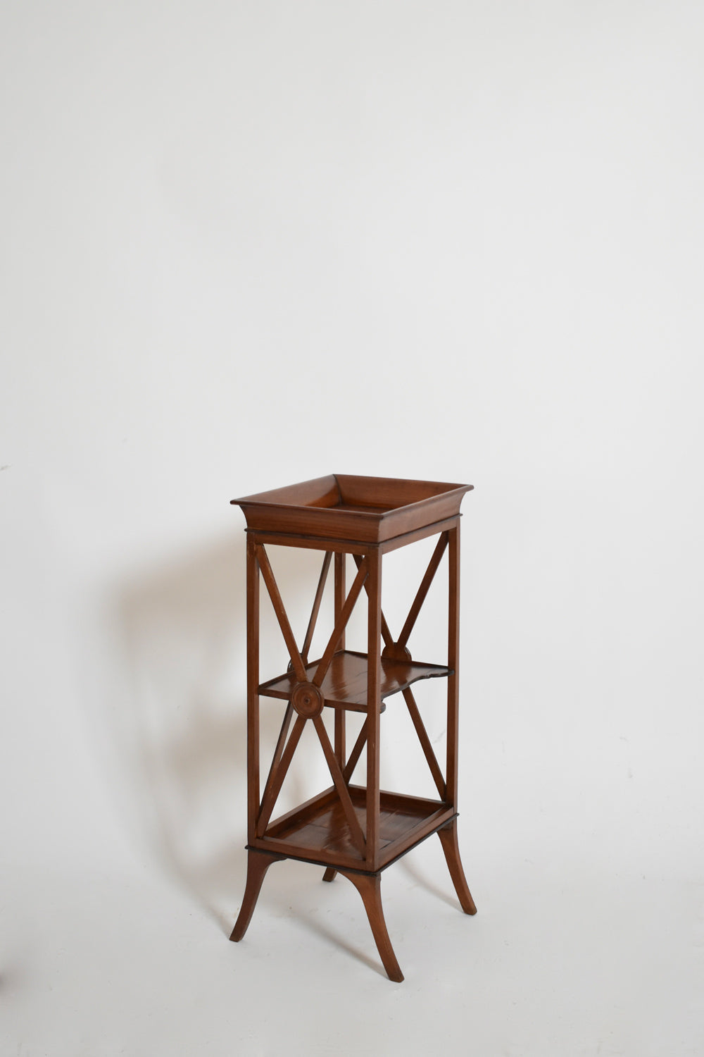 Pair of neoclassical mahogany bedside tables, 1960s.