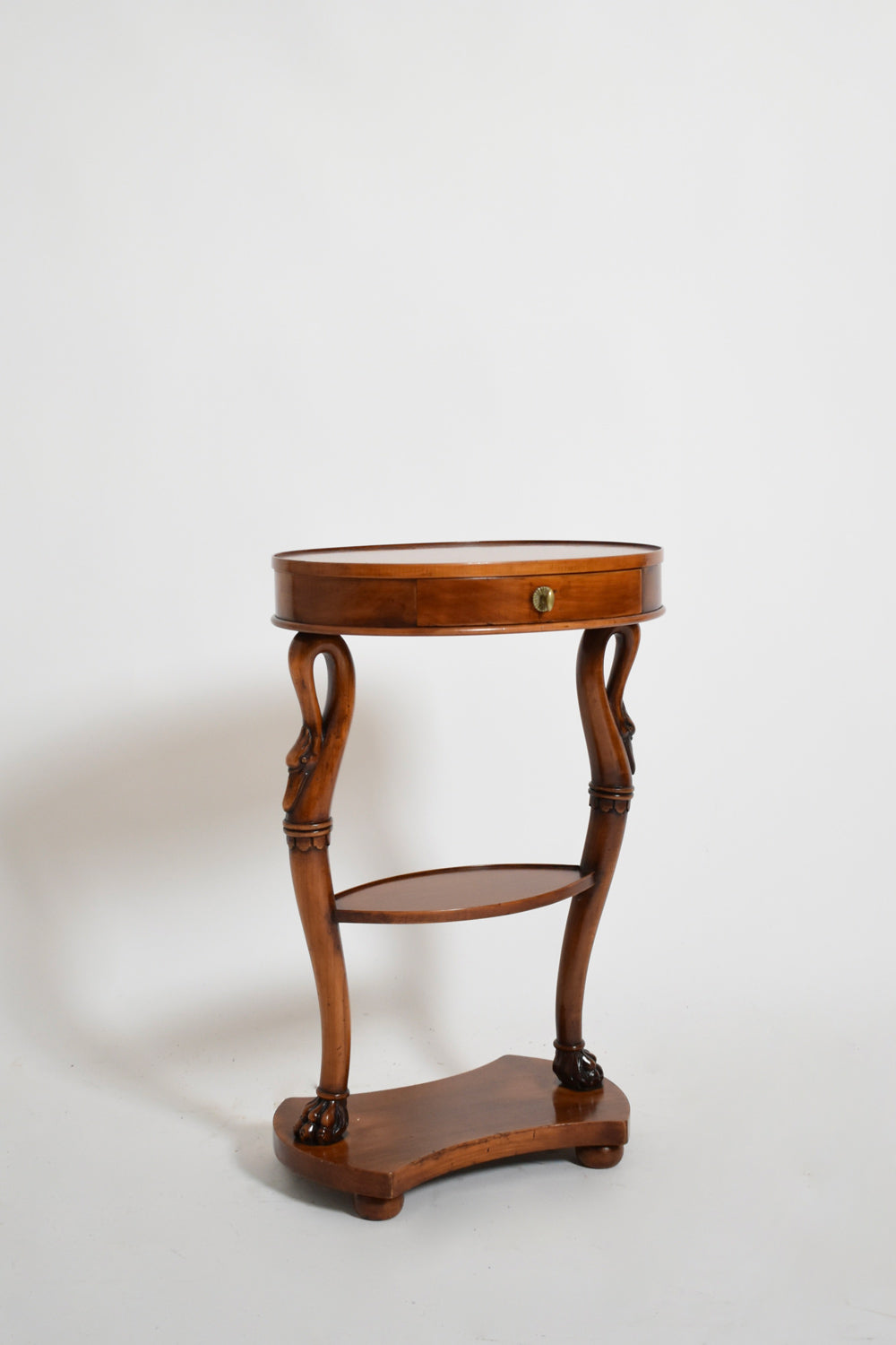 Pair of oval swan side tables, 1900s