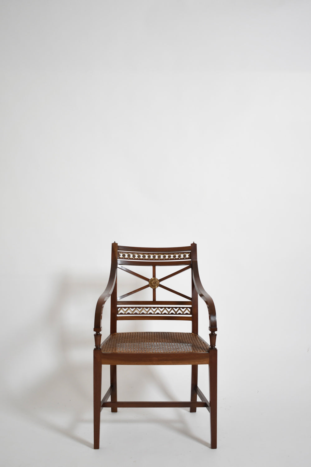 Pair of neoclassical mahogany and canning armchairs, XIXth c.