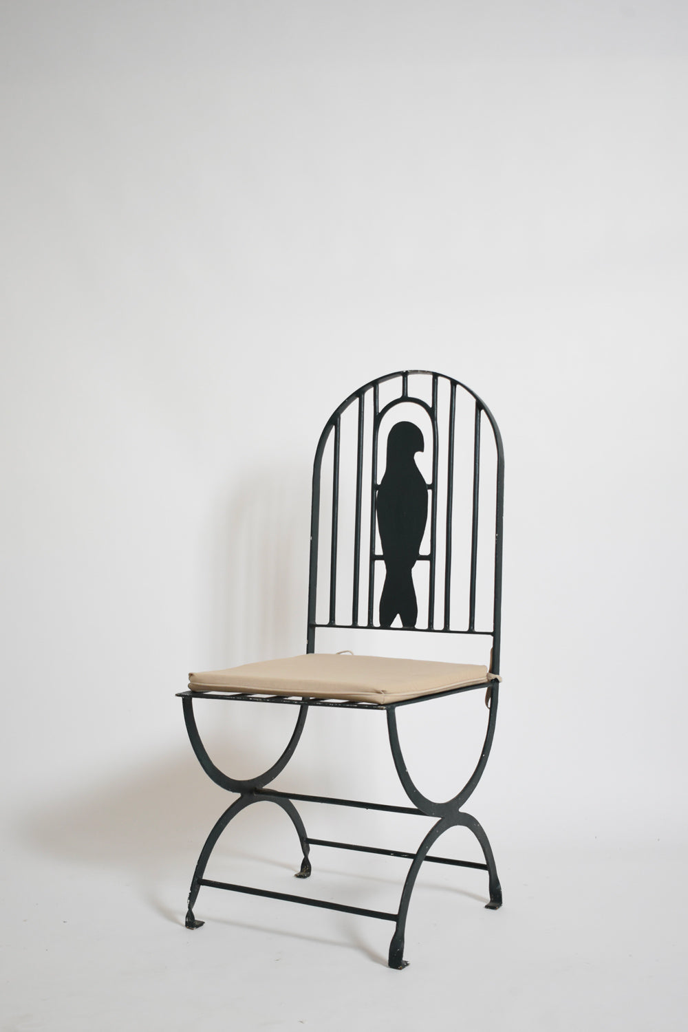 Pair of wrought iron bird cage chairs, 1960s.