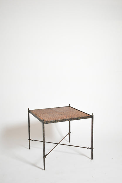 Pair of wrought iron and wicker side tables, 1970s.