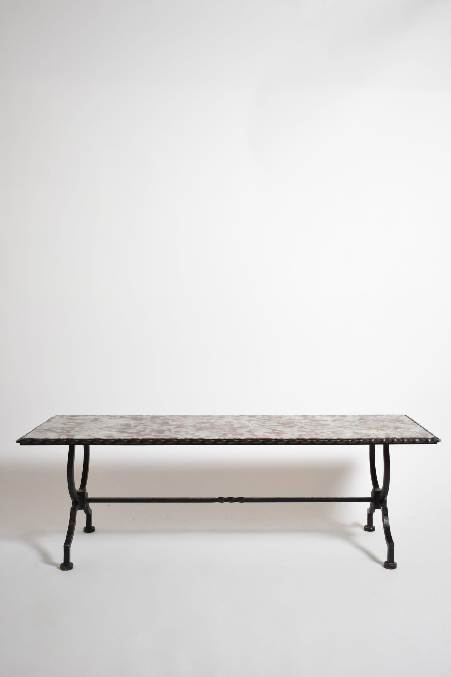 Wrought iron and marble coffee table, 1940s.