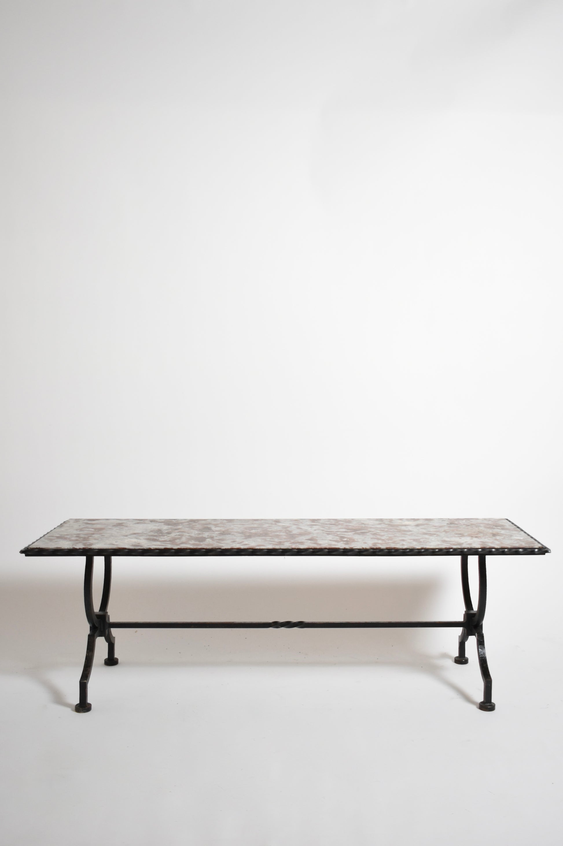 Wrought iron and marble coffee table, 1940s.