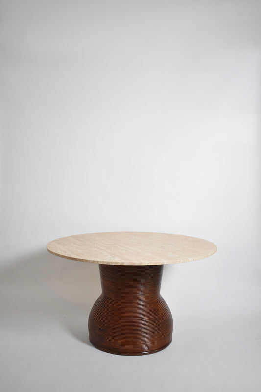 Rattan and travertine round dining table, 1970s.