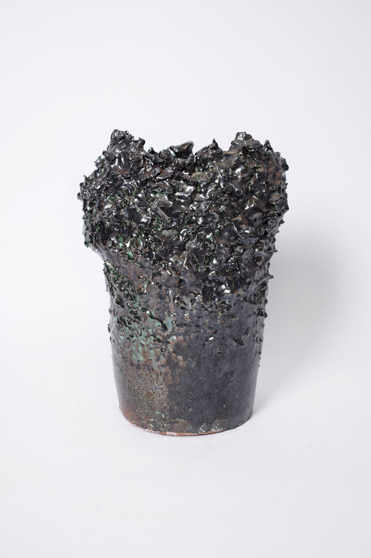 Green and black vase with texture, Helder.