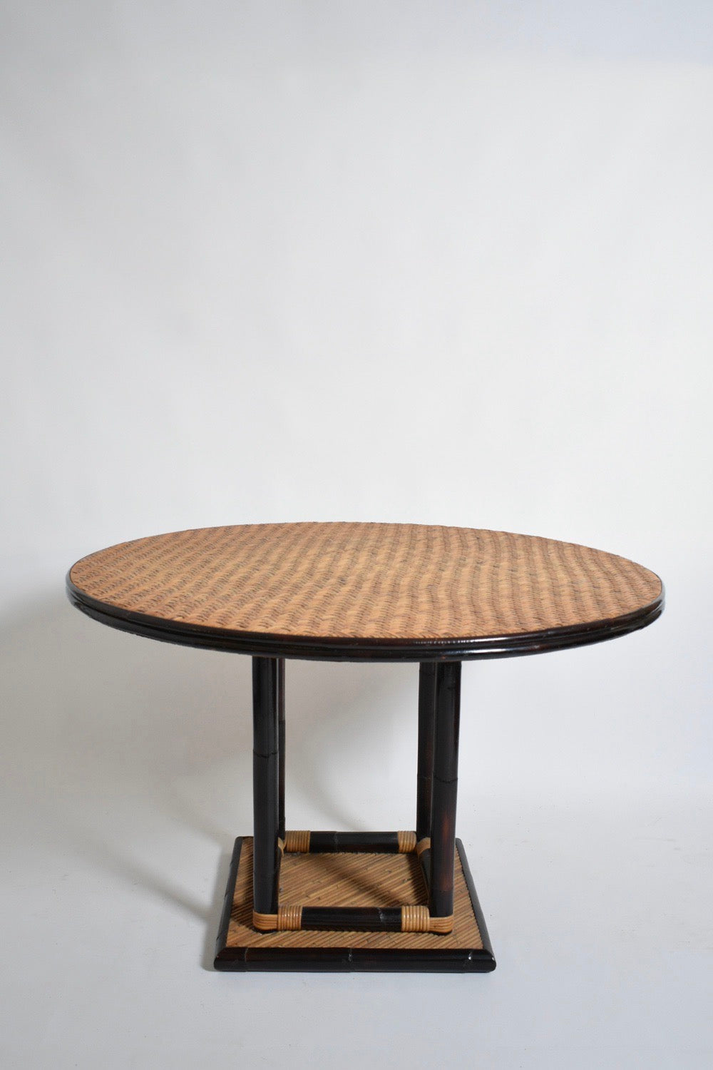 Bicolor round rattan dining table, 1970s.