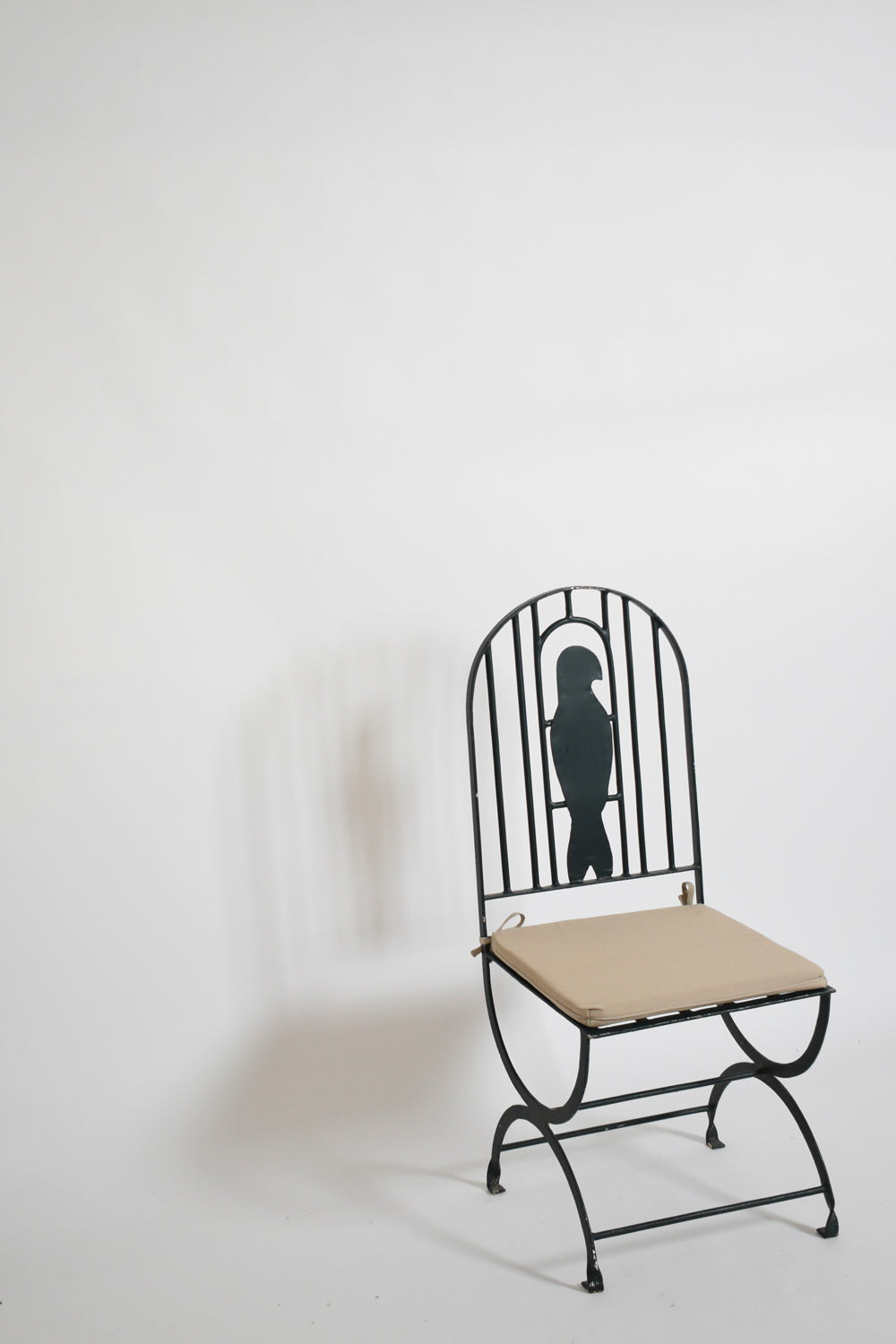 Pair of wrought iron bird cage chairs, 1960s.
