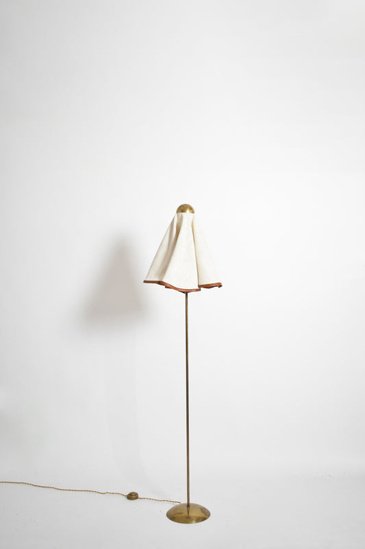 Brass, fabric and leather floor lamp, 1960s.