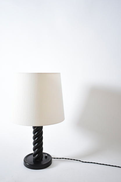 Turned ebonised column table lamp, 1960s.