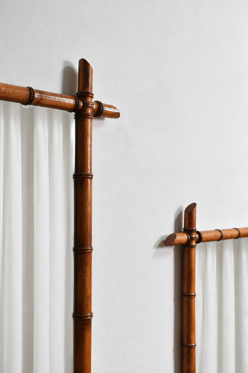 Pair of wooden faux bamboo mirrors, 1920s.