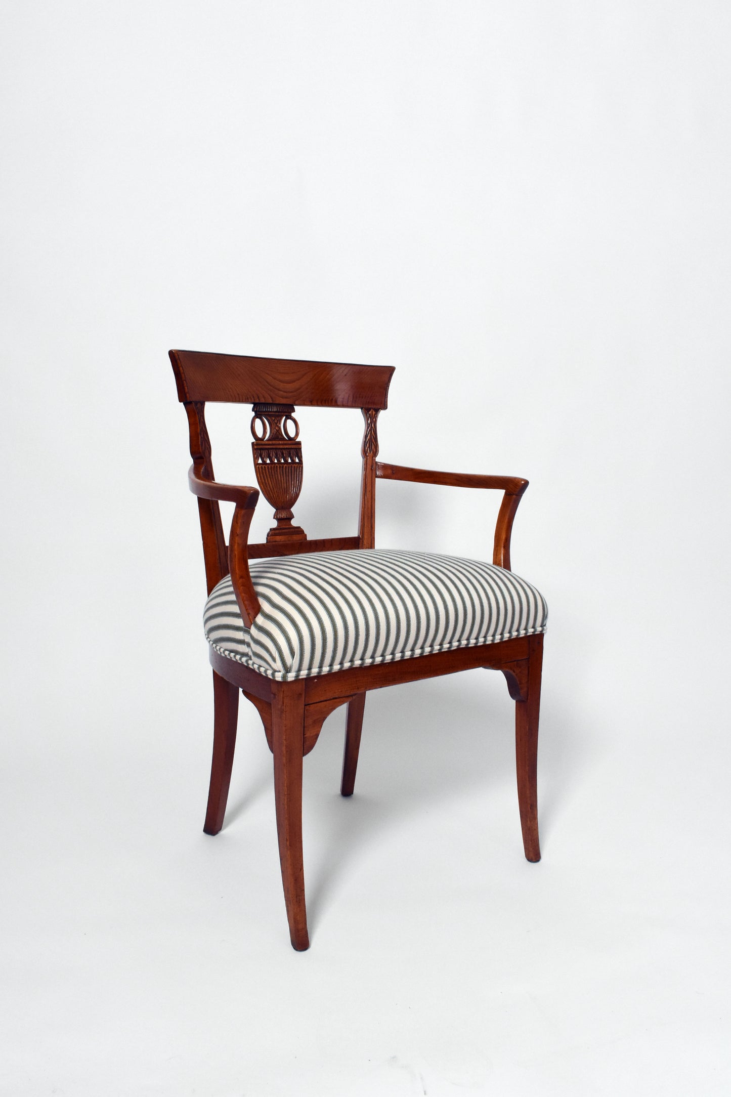 Neoclassical wooden armchair, 19th c.