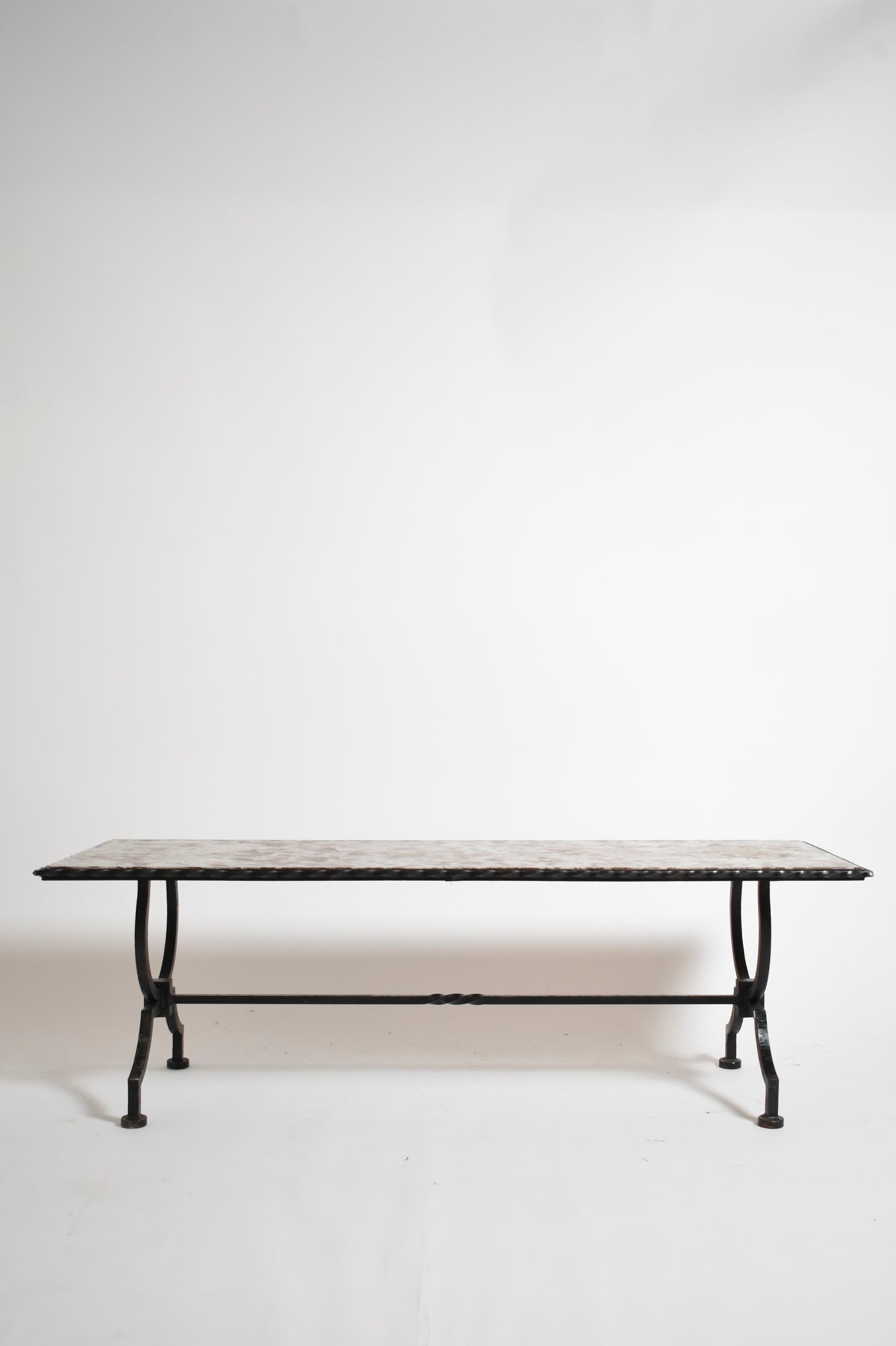 Wrought iron and marble coffee table, 1940s.